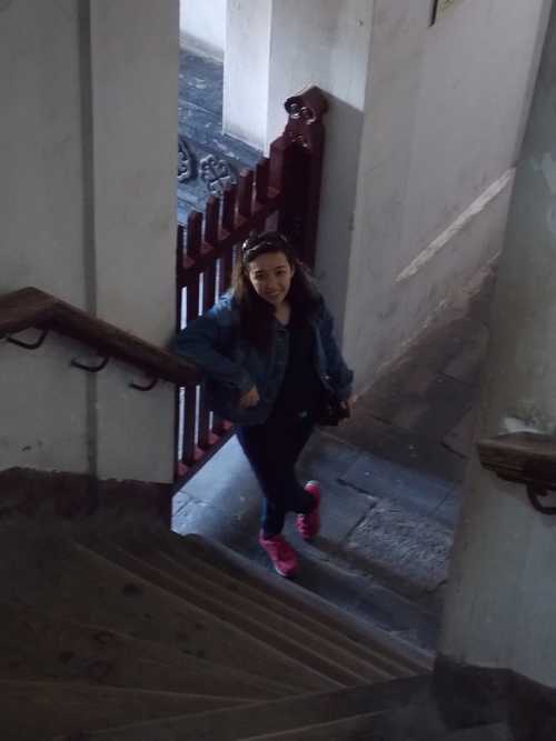 Brittany at the bottom of the steep staircase Brittany