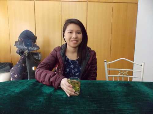 Me trying the Longjin tea me sipping tea