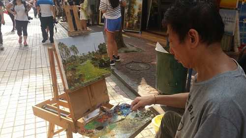 A painter in action painter