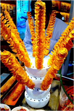 Appetizing stacked potato chips on a stick stacked potato chips