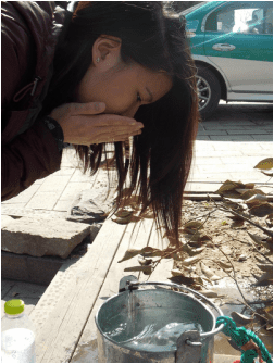 My turn to wash my face with well water me washing my face with well water